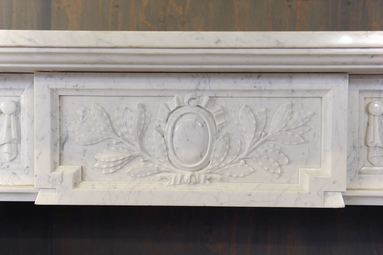 Carrara Marble A 19th century French Neoclassical Carrara marble fireplace / mantle piece